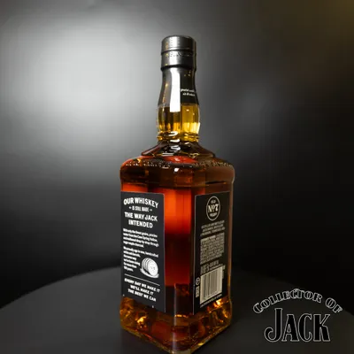 Rear angle of the bottle with label and embossing