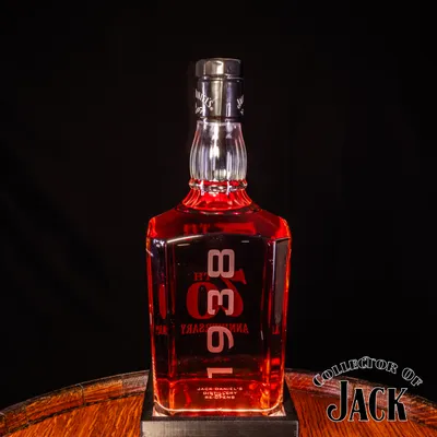 Back of 70th Anniversary bottle with large “1938” text.