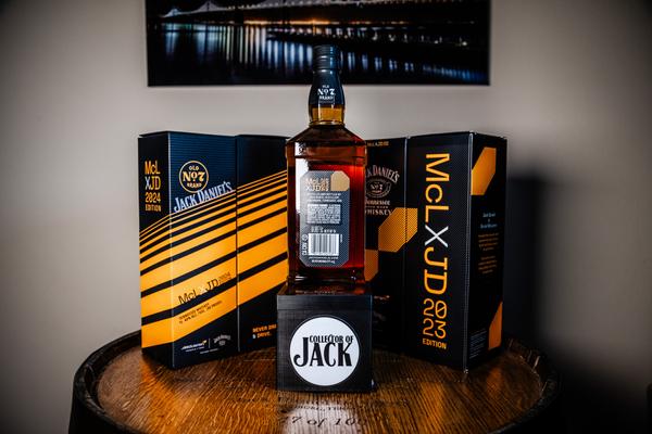 2024 Jack Daniel's x McLaren collaboration bottle from the rear with '24 and '23 boxes in background